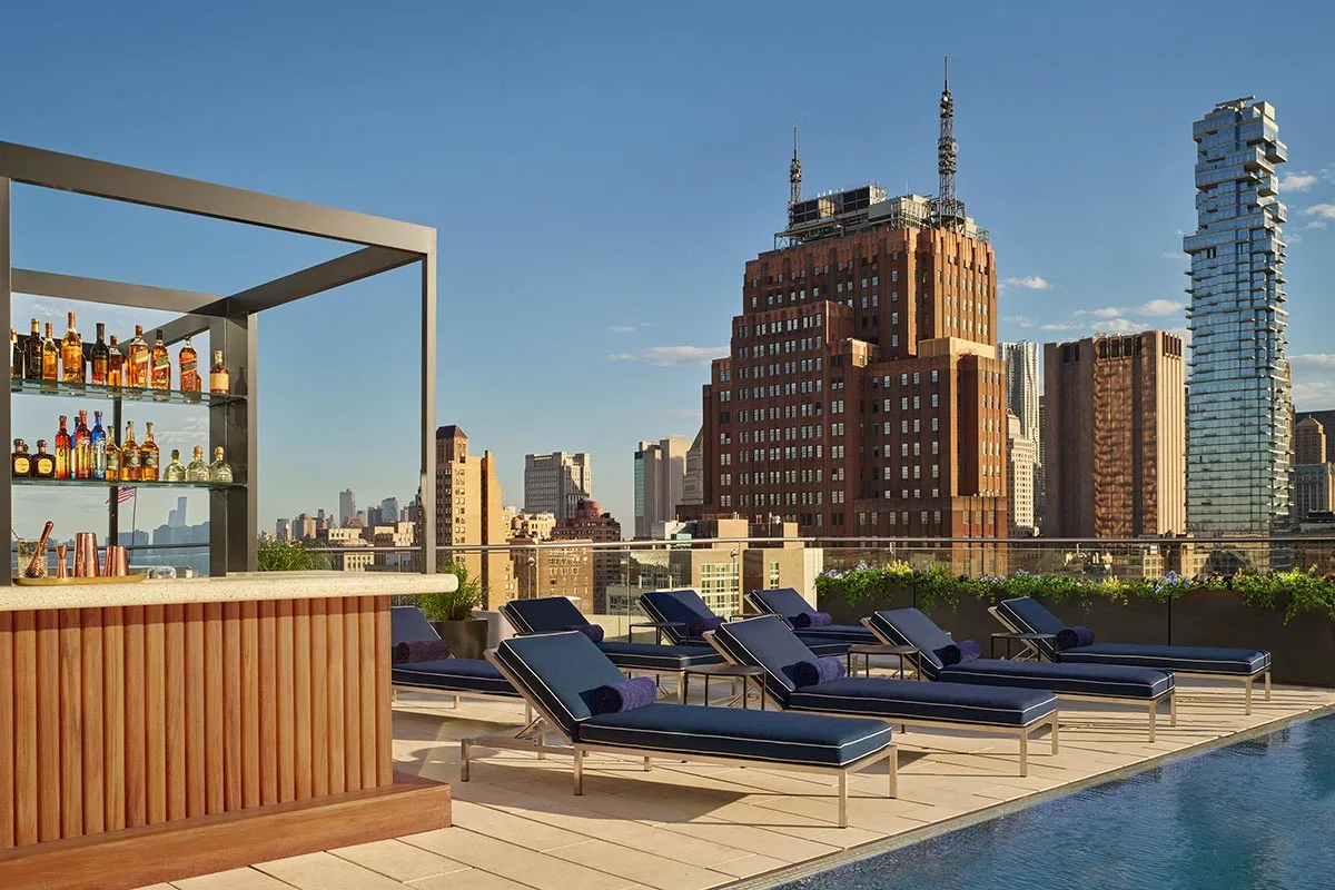 Modernhaus Rooftop Bar counter, pool and pool lounger chairs